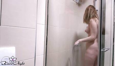 Horny girl fingering in the bathroom