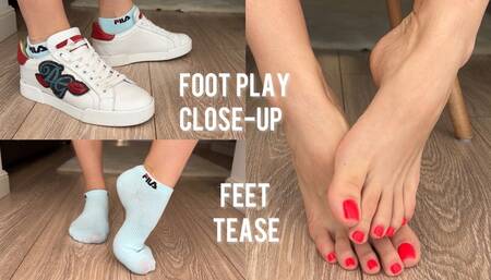 Foot play close-up, feet tease
