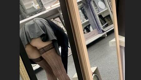 Shopping in leather mini skirt no panties