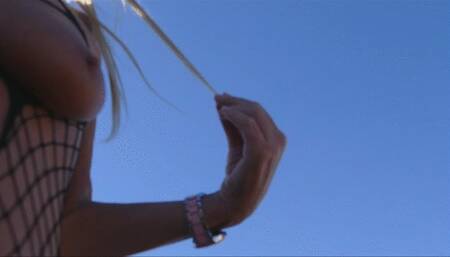 Outdoors in fishnet crotchless bodystocking spitting & sucking, fucking a dildo sex toy