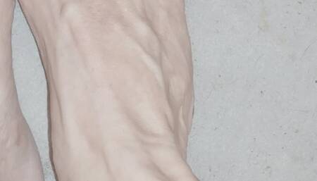 Tempest showing off toes as they dry