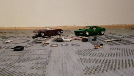 Two model cars crushed
