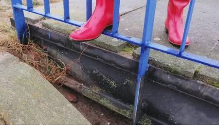 Black latex and red rubber boots