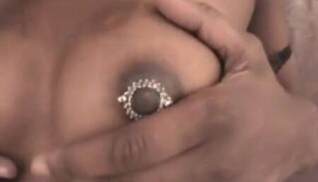 Pierced nippled ebony teen getting fingered