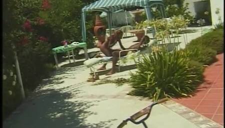 Ebony slut gets a wicked backshot at the pool