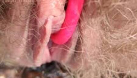 Hairy pussy peeing with Lovense in public