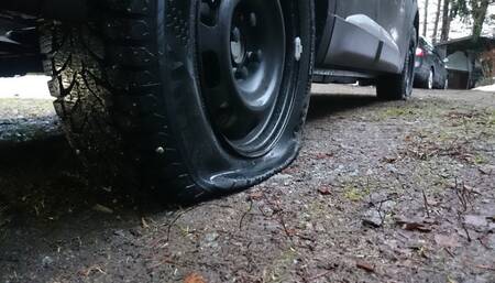 Two big tyres going down and FILA sneakers