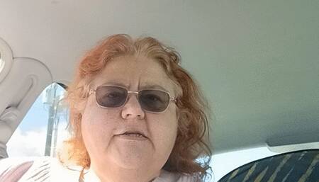 BBW smoking in pink sweater in her car talking to her fans