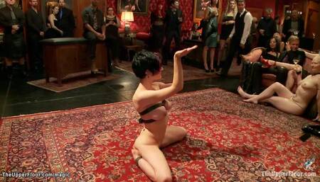 Busty bound slut sucking at bdsm party