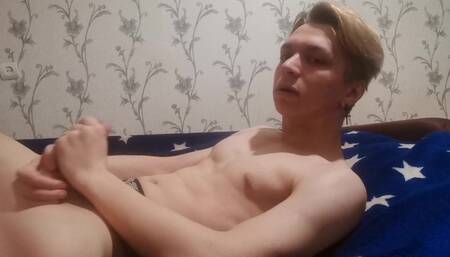 Twink plays with hard cock