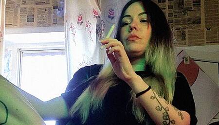 Petite stepsister smokes a cigarette