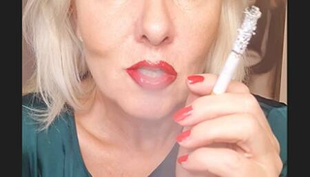 Smokerqueenjoan smoking close up in satinblouse with lots of creamy smoke and shiny red lips