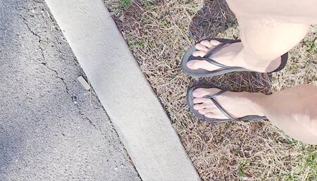 Walking around in black thong flip flops