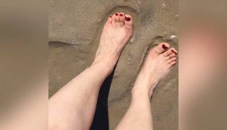 Squishing my cute size 7 feet in the sand