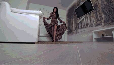 Black panties under a long leopard print dress a