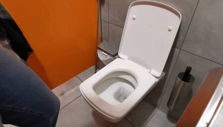 Groaning in public toilet while high traffic