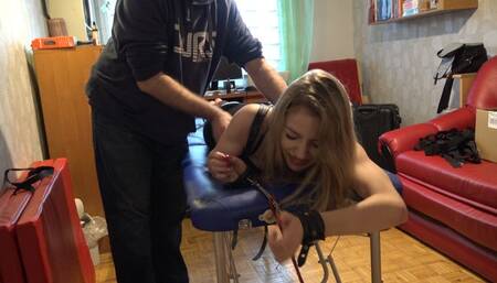 Tickling face down Justyna Anna body on the table