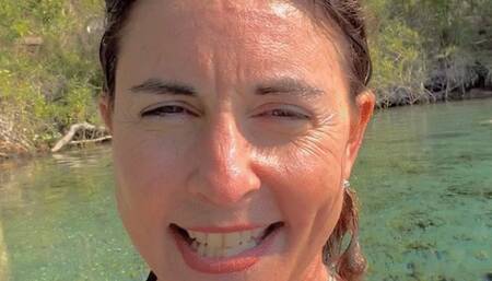 Carissa plays with her new weightbelt in the springs