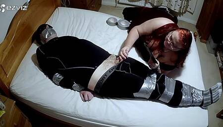 Duct taped on bed in black compression gear - Part 1 of 2 -BBW domination,BBW Bondage,man in Bondage,male bondage,amateur,man tied up,bound and gagged man,tape bondage,duct tape,duct taped,taped up,leggings,socks,struggling,hogtie,hogtied,gay bondage,