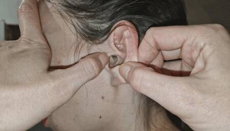 Dirty dark ear canal