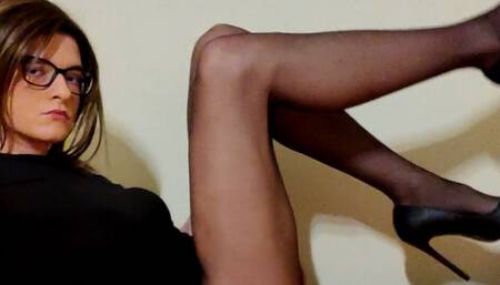 Miczi in high heels and black stockings eats sperma from condom