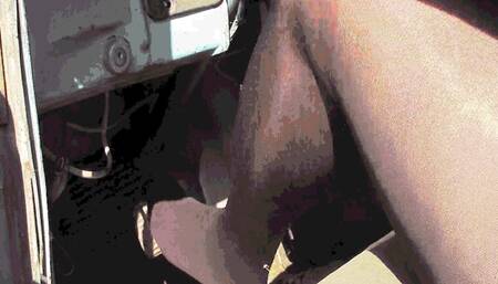 Inflating the pedals of an old ZIL car in black pantyhose with bare feet