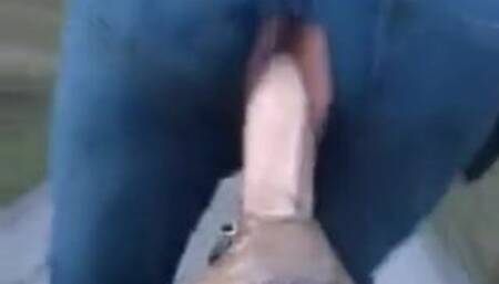 Riding a dildo bike & it fucks her through her pants