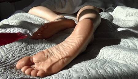 Christine feet tickling with a feather