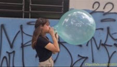 Katie Blows to Pop a Soapy 16" Gemar Balloon