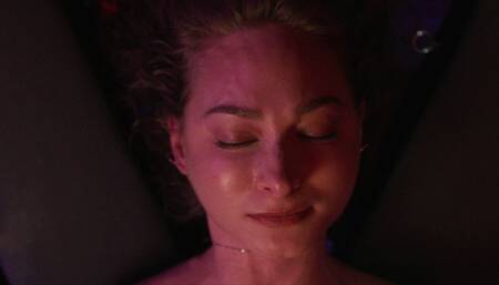 Lilith awakes upside down suspended on a cross