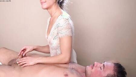 A lucky fellow gets his cock stroked by oily chick