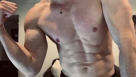 Devon flexing his muscles up close SD