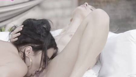 Christy White and her girlfriend are sharing double-sided dildo