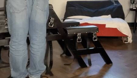 A caning over his trousers