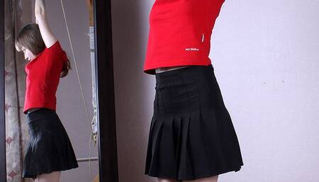 Agnes: barefoot girl in red top and black skirt, tied up standing on her toes with her hands tied up high above, wiggles on the floor at the mirror (HD WMV)