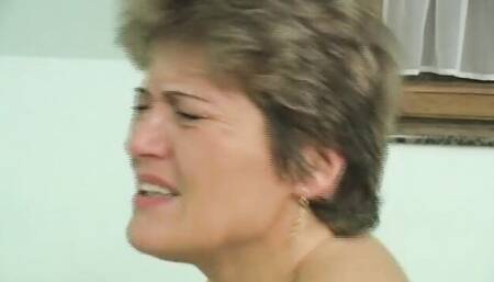 Short-haired MILF moans while stepson brutally fucks her ass