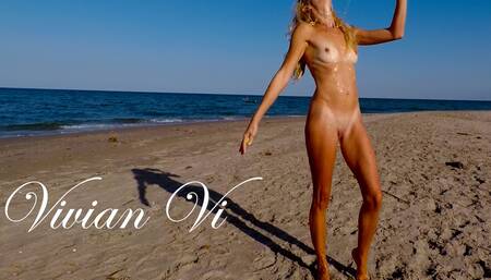 Naked Workout on the beach - a beautiful skinny milf with small tits