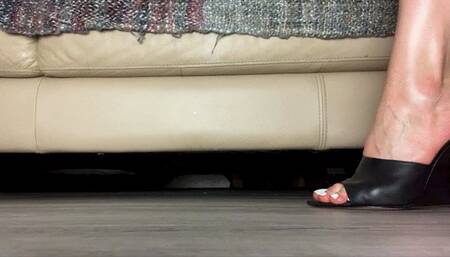 Leather mules feet closeup