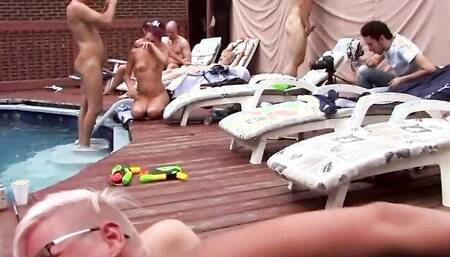 Horny girls and guys are having wild sex orgy by the pool