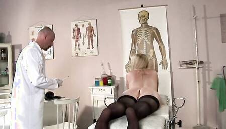 Naughty doctor manhandles that blonde and fucks her on the table