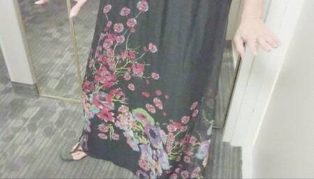 Tempest showing in black floral dress