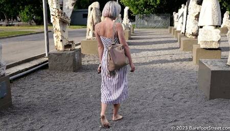 Beautiful blonde Anastasia walks barefoot in the hot summer city (Part 2 of 3) #20230225