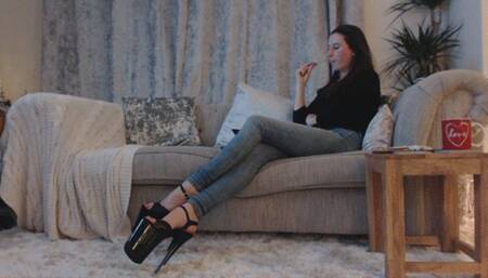 Human footstool relaxing 8 inch sandals (WMV)