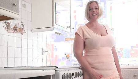 Curvy mature woman gives JOI while masturbating in the kitchen