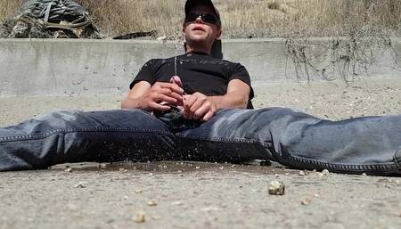 Pissing all over myself in a drainage ditch