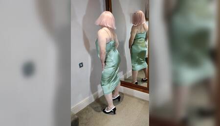 Hot crossdresser in green satin dress