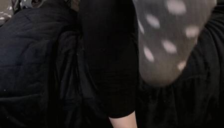 Feet show, one sock on one sock off