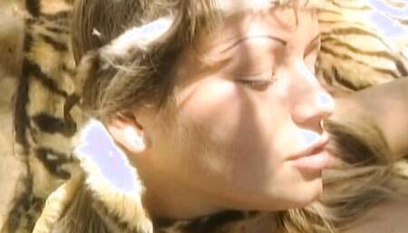 Classic video shows a horny blonde having sex in the woods