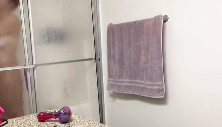 MILF with saggy natural tits is secretly filmed in the bathroom