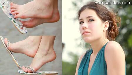 Elisa's shiny flip flops shoe dangling - 13060